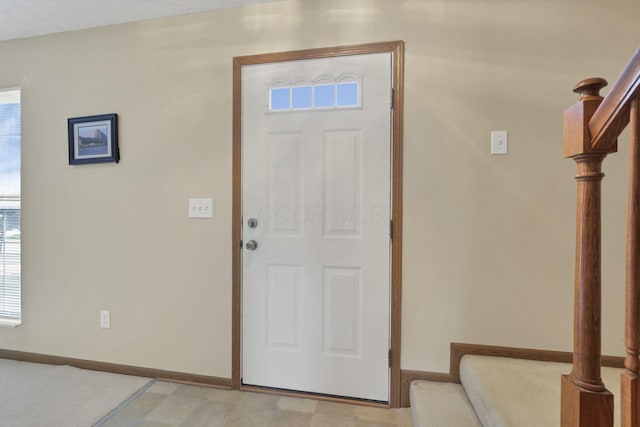 6495 Saylor St, Canal Winchester, OH 43110 - foyer entrance with stairway and baseboards