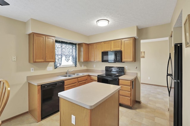 6495 Saylor St, Canal Winchester, OH 43110 - kitchen with black appliances, a sink, light countertops, baseboards, and a textured ceiling
