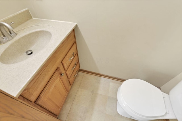 6495 Saylor St, Canal Winchester, OH 43110 - bathroom featuring vanity, toilet, and baseboards