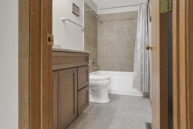 6495 Saylor St, Canal Winchester, OH 43110 - full bathroom featuring shower / bath combo with shower curtain, tile patterned flooring, toilet, and vanity