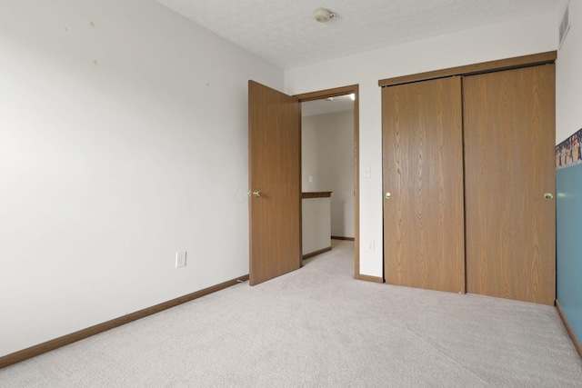 6495 Saylor St, Canal Winchester, OH 43110 - unfurnished bedroom featuring carpet, a closet, and baseboards