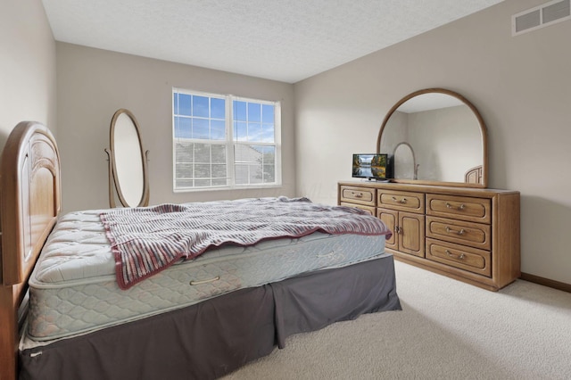 6495 Saylor St, Canal Winchester, OH 43110 - bedroom featuring light carpet, a textured ceiling, and baseboards