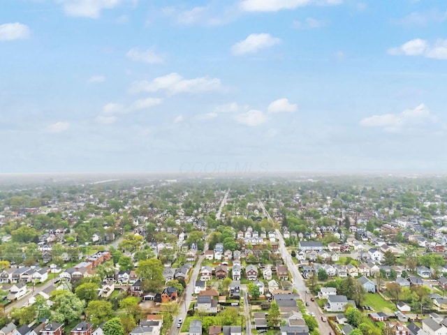 aerial view of property's location featuring nearby suburban area