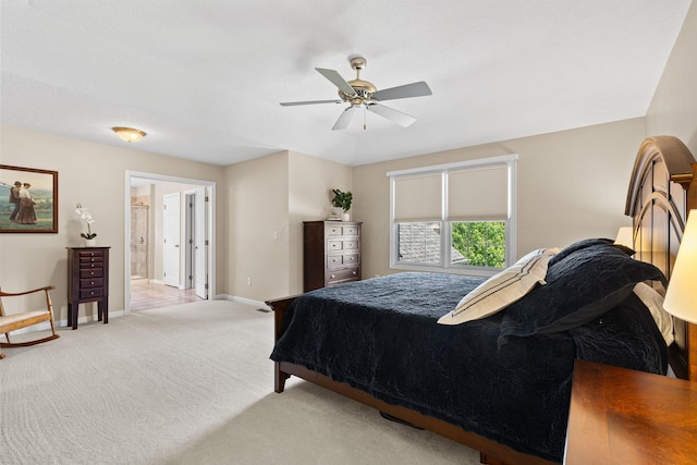 2543 Kemperwood Dr, Blacklick, OH 43004 - bedroom featuring light colored carpet, baseboards, a ceiling fan, and ensuite bathroom