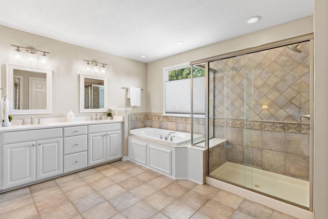 2543 Kemperwood Dr, Blacklick, OH 43004 - bathroom featuring double vanity, a stall shower, and a garden tub