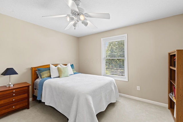 2543 Kemperwood Dr, Blacklick, OH 43004 - bedroom with light colored carpet, baseboards, and a ceiling fan