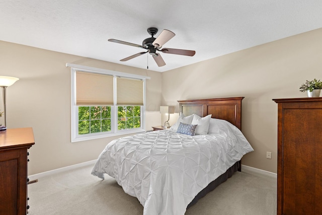 2543 Kemperwood Dr, Blacklick, OH 43004 - bedroom with light colored carpet, baseboards, and ceiling fan