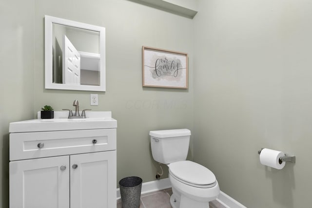 2543 Kemperwood Dr, Blacklick, OH 43004 - bathroom featuring toilet, vanity, baseboards, and tile patterned floors