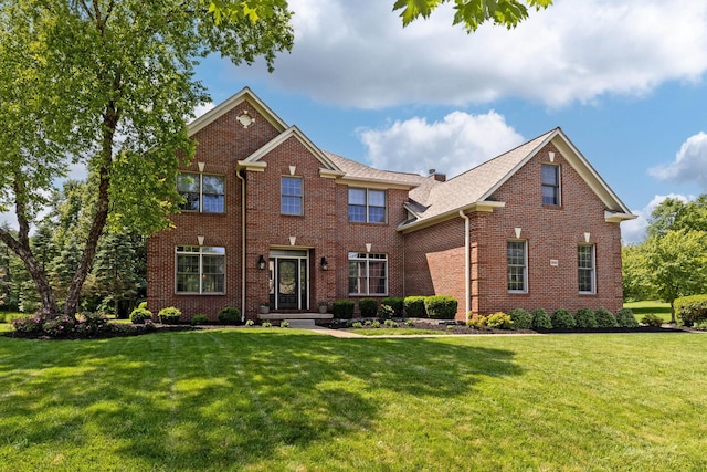 2543 Kemperwood Dr, Blacklick, OH 43004 - colonial-style house with brick siding and a front yard