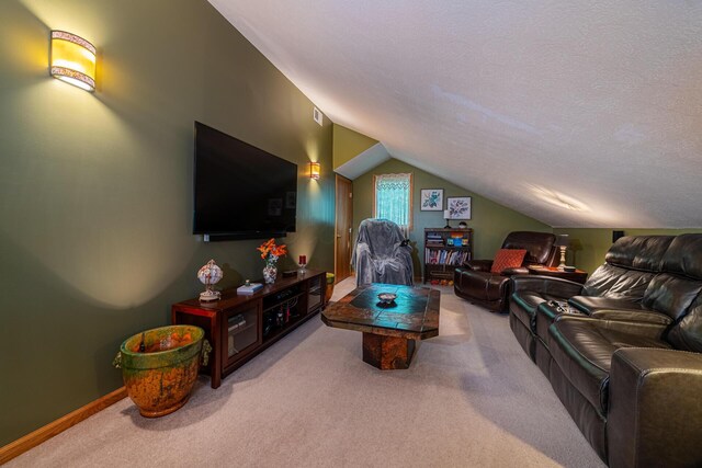 living room with a textured ceiling, carpet, baseboards, vaulted ceiling, and visible vents