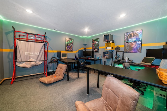 carpeted office with recessed lighting, a textured ceiling, and visible vents