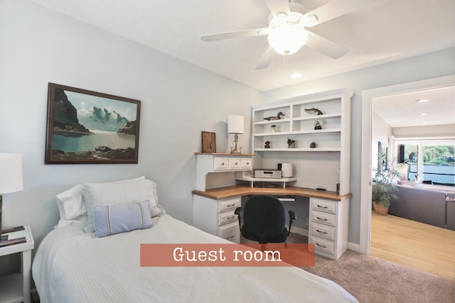 bedroom with ceiling fan, light carpet, and recessed lighting