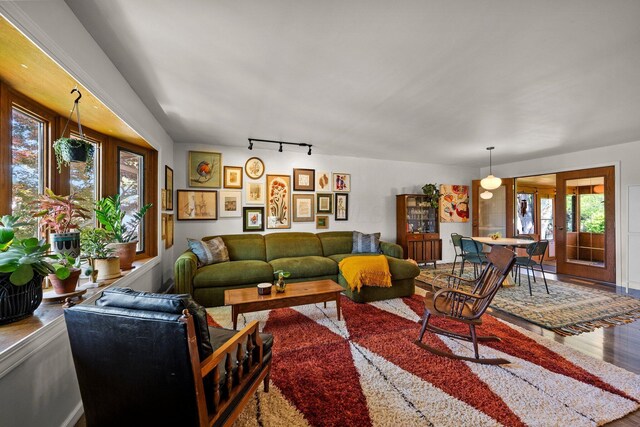 746 Ronson Ave, Columbus, OH 43230 - living room featuring wood finished floors and rail lighting