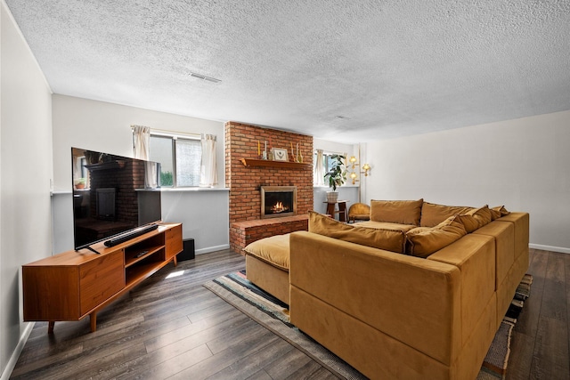 746 Ronson Ave, Columbus, OH 43230 - living area with a fireplace, a textured ceiling, dark wood-style floors, and baseboards