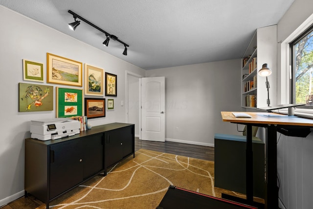 746 Ronson Ave, Columbus, OH 43230 - office area with dark wood finished floors, rail lighting, a textured ceiling, and baseboards