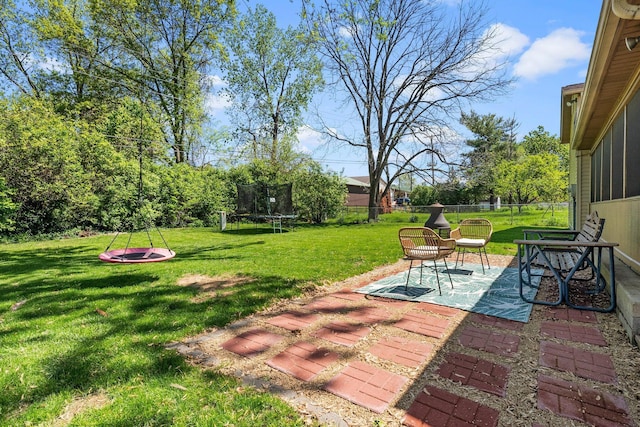 746 Ronson Ave, Columbus, OH 43230 - view of yard with a trampoline and a patio
