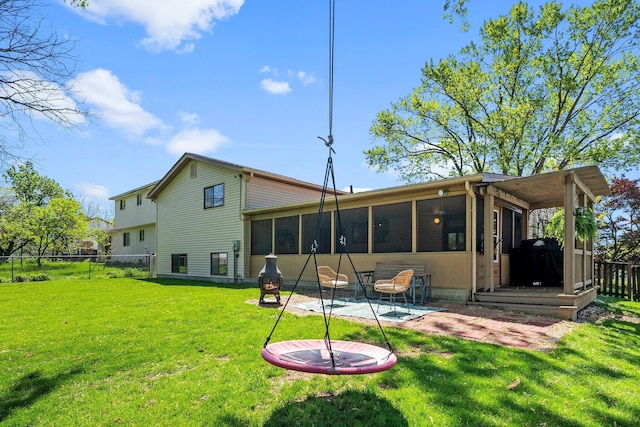 746 Ronson Ave, Columbus, OH 43230 - rear view of property with a sunroom and a patio