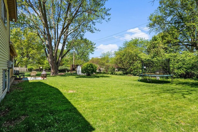 746 Ronson Ave, Columbus, OH 43230 - view of yard featuring a trampoline and a patio area