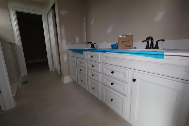 1012 Heimat Haus Dr N, Grove City, OH 43123 - bathroom featuring double vanity and tile patterned flooring