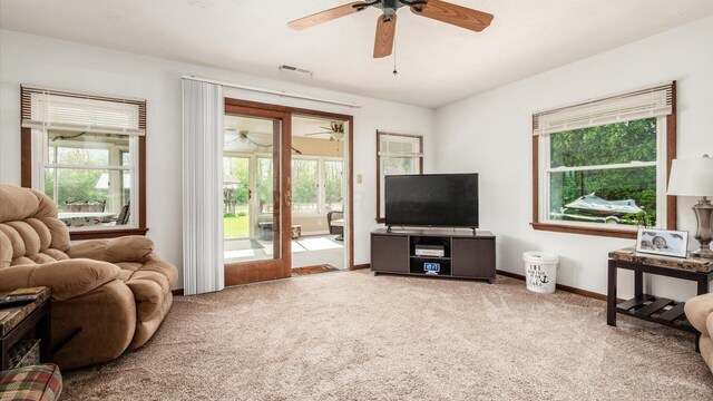 14672 Township Rd Unit 1062, Thornville, OH 43076 - carpeted living room featuring a ceiling fan, plenty of natural light, and baseboards
