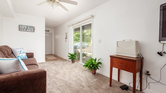 14672 Township Rd Unit 1062, Thornville, OH 43076 - carpeted living area featuring a ceiling fan and baseboards
