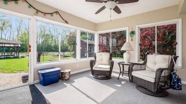 14672 Township Rd Unit 1062, Thornville, OH 43076 - sunroom featuring a ceiling fan and healthy amount of natural light