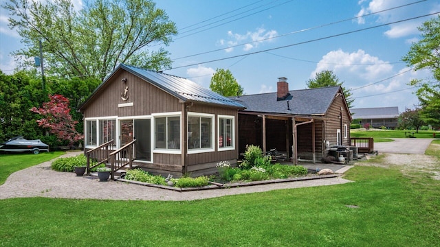 14672 Township Rd Unit 1062, Thornville, OH 43076 - rear view of house featuring a yard, a patio, and entry steps
