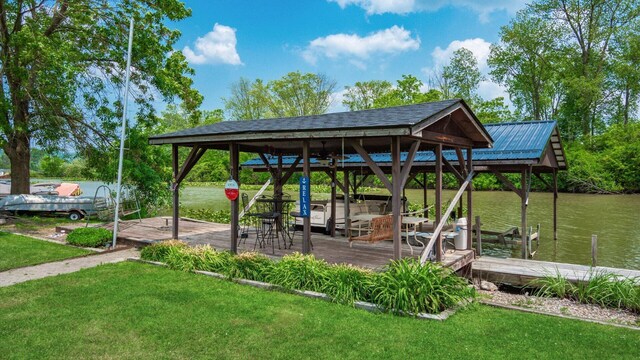14672 Township Rd Unit 1062, Thornville, OH 43076 - view of community with a yard, a dock, boat lift, and a water view