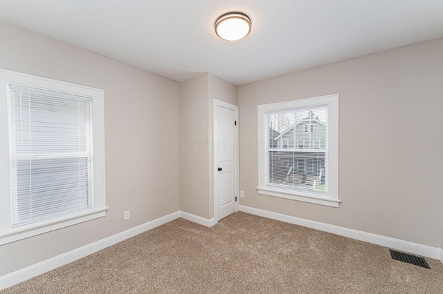 146 E Woodrow Ave, Columbus, OH 43207 - unfurnished room with light colored carpet and baseboards