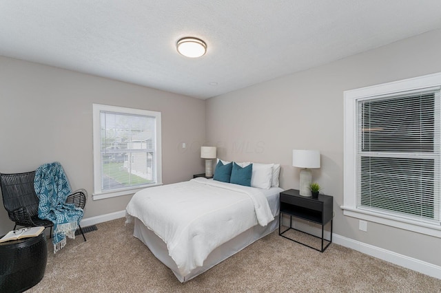 146 E Woodrow Ave, Columbus, OH 43207 - carpeted bedroom with baseboards