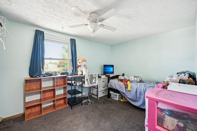 bedroom with carpet, a ceiling fan, and a textured ceiling