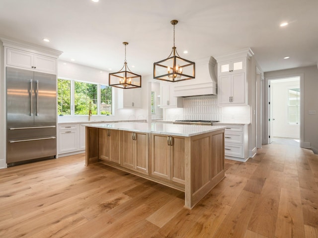2355 Farleigh Rd, Columbus, OH 43221 - kitchen featuring appliances with stainless steel finishes, premium range hood, backsplash, recessed lighting, and light wood finished floors