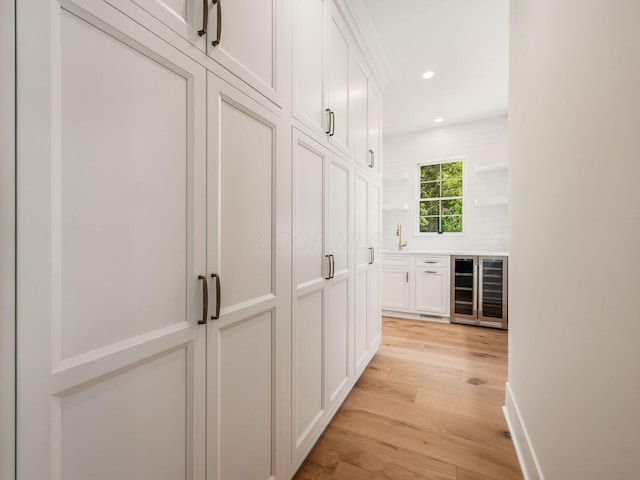 2355 Farleigh Rd, Columbus, OH 43221 - corridor with wine cooler, light wood-style floors, and recessed lighting