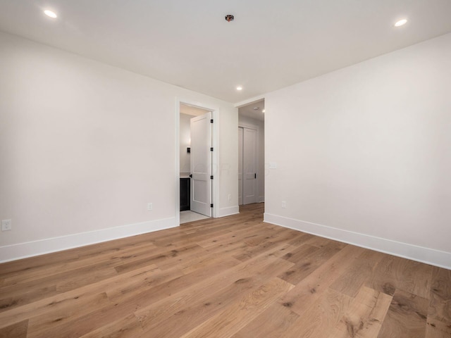 2355 Farleigh Rd, Columbus, OH 43221 - unfurnished room with baseboards, light wood-type flooring, and recessed lighting