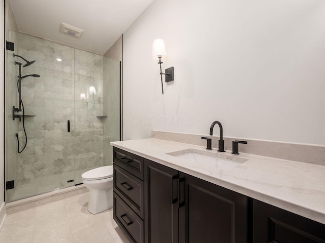 2355 Farleigh Rd, Columbus, OH 43221 - full bathroom with vanity, a stall shower, toilet, and tile patterned flooring
