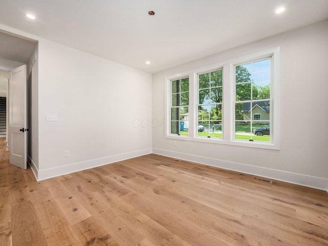 2355 Farleigh Rd, Columbus, OH 43221 - unfurnished room featuring baseboards, light wood-style flooring, and recessed lighting