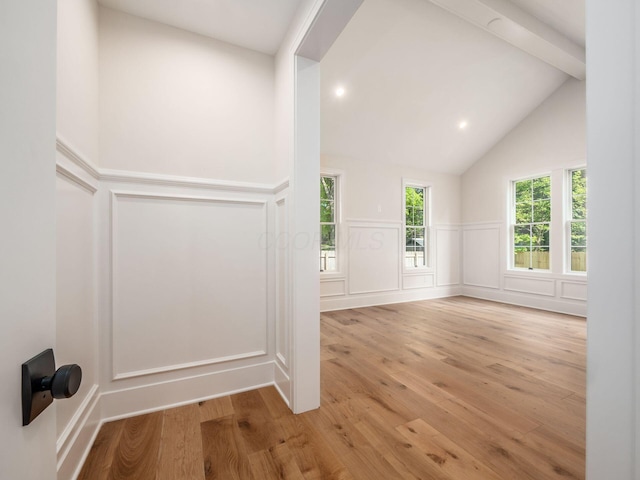 2355 Farleigh Rd, Columbus, OH 43221 - spare room featuring a decorative wall, wood finished floors, wainscoting, recessed lighting, and high vaulted ceiling