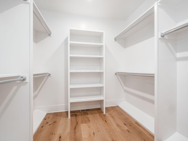 2355 Farleigh Rd, Columbus, OH 43221 - spacious closet with wood finished floors