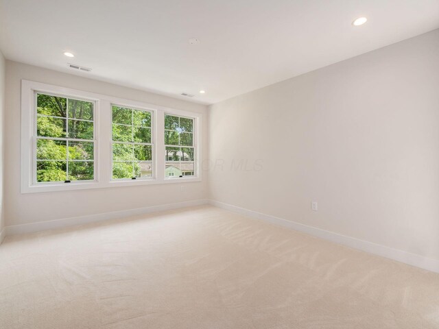 2355 Farleigh Rd, Columbus, OH 43221 - spare room featuring light carpet, baseboards, and recessed lighting