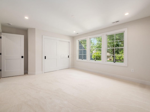 2355 Farleigh Rd, Columbus, OH 43221 - unfurnished bedroom featuring carpet floors, baseboards, recessed lighting, and a closet