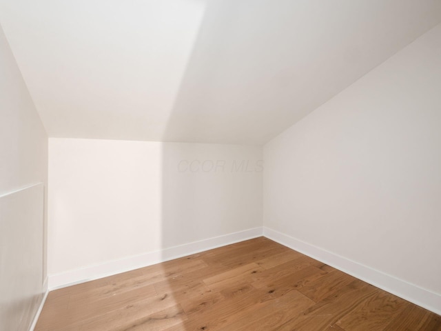2355 Farleigh Rd, Columbus, OH 43221 - bonus room with vaulted ceiling, light wood-style floors, and baseboards