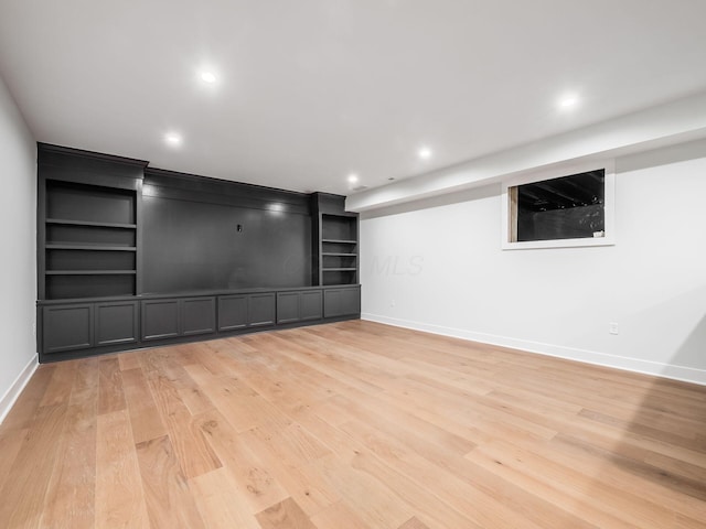 2355 Farleigh Rd, Columbus, OH 43221 - unfurnished living room with light wood finished floors, baseboards, recessed lighting, and built in shelves