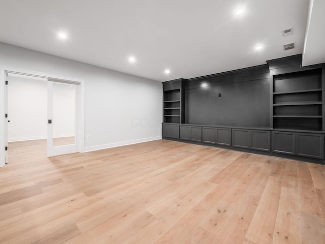 2355 Farleigh Rd, Columbus, OH 43221 - unfurnished living room with light wood-style floors, recessed lighting, baseboards, and built in features
