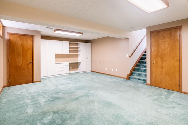 4977 Softwood Ct, Westerville, OH 43081 - finished below grade area featuring carpet, stairs, and baseboards