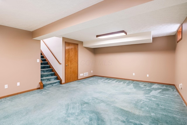 4977 Softwood Ct, Westerville, OH 43081 - finished basement with baseboards, carpet, stairs, and a textured ceiling