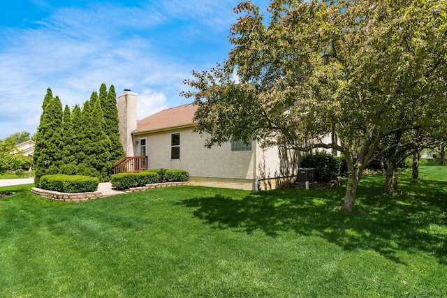 4977 Softwood Ct, Westerville, OH 43081 - view of green lawn with central AC