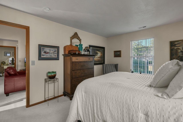 1324 Hillview Cir W, Newark, OH 43055 - bedroom featuring baseboards, visible vents, and light carpet
