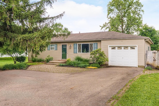 109 Williams Rd, Columbus, OH 43207 - ranch-style home featuring driveway and an attached garage