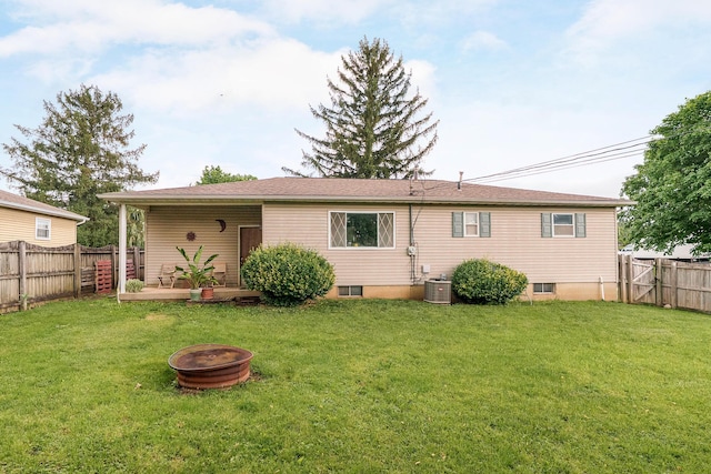 109 Williams Rd, Columbus, OH 43207 - rear view of property featuring an outdoor fire pit and central AC