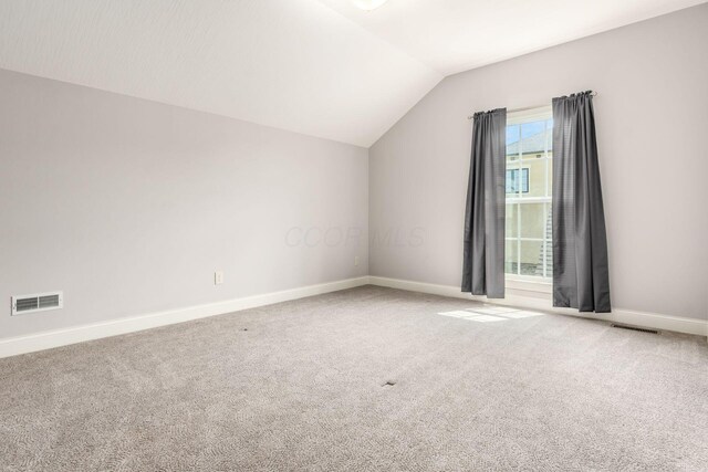 1393 Kearney Way, Delaware, OH 43015 - bonus room featuring vaulted ceiling, baseboards, and carpet flooring